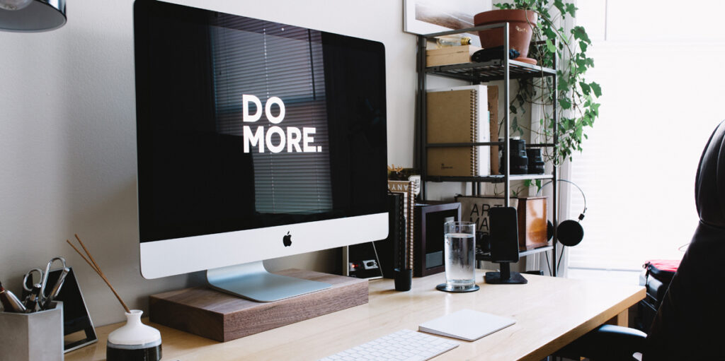 Computer monitor with the words Do More